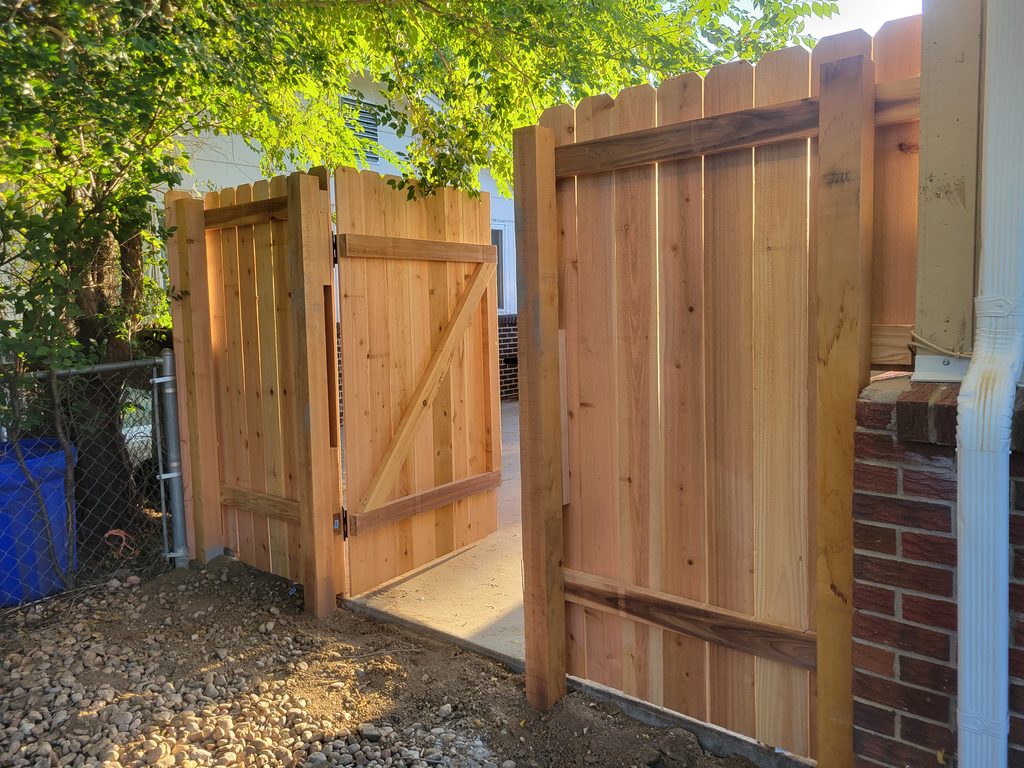 Custom wood fence gate installation